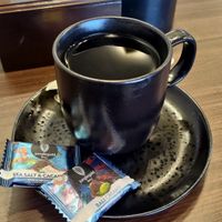 Green tea with complementary chocolate (1 piece per beverage) at Junglegold Bali - Sanur in Sanur