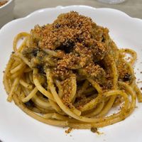 Pasta con “sarde”, wild fennel and “muddica atturrata"  at In Cottura - Home Vegan Restaurant in Palermo