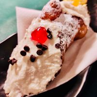 a HUGE cannolo di dattilo with almond ricotta and more at In Cottura - Home Vegan Restaurant in Palermo