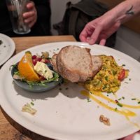 Vegan Scramble with cherry tomatoes and herbs at IVY Bistro & Café in Hamburg