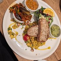 Vegan Scramble & berry-nutty salad bouquet and Swiss Bürli (bread),
– with cherry tomatoes and herb. Upgrade to add 3  extras:
– aubergine tartare
– avocado tartare
–  at IVY Bistro & Café in Hamburg