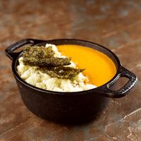 Caldo de moqueca com farofa d’água e crispy de nori  at PARCO in Salvador