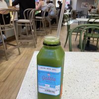 Healthy juice, tables to sit and eat at Gastro Market in New York City