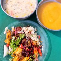 Sopa de mani, pumpkin soup, salad plate  at Raul in Cochabamba