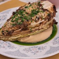 Roasted cabbage on bean hummus at Barbarella PLANT Bistro in Ljubljana