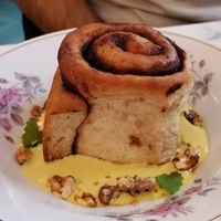Cinnamon bun on creme. at Barbarella PLANT Bistro in Ljubljana