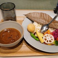 Something or other curry. Presentation is very cool but why is the curry separate from the rice? Why must I do this much labour for a simple meal? No, you don't eat the giant leaf. at TOSSO Hoba in Tokyo