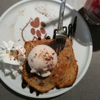 Banana bread with ice cream and whipped cream. at Katzentempel - Trier  in Trier