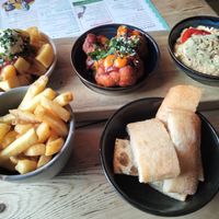 Patatas bravas, bang bang cauliflower, hummus & chips. at Lounges - Santo Lounge in Southampton