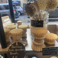 Dish brushes, handled ones come with replaceable head  at La Petite Épicerie Nyc in New York City