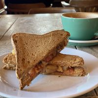 Vegan & gluten free toastie with tomato, onion, pineapple and mushrooms .  at Cafe Nevé in Fox Glacier