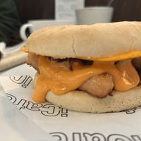 Vegan bap (vegan sausages, sriracha mayo, red onions, potato scone, vegan cheese)  at iCafe - Merchant City in Glasgow
