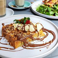 Waffle with banana, chocolate-hazelnut sauce at Vegan Backyard in Berlin