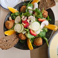 Falafel salad bowl (omg those strawberries!) at Santé in Mallorca