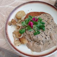 Vegan Schnitzle with mushroom sauce, mushrooms, potatoes and onion at Santé in Mallorca