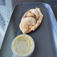 Vegan pepperoni empanada  at Vintage Caffeine Co in Calgary