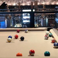 Pool table overlooking bar area at Nova Terra Kitchen & Creamery in Sebastopol