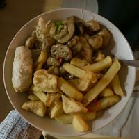 Salt & pepper chips, tofu & mushrooms; veggie rice noodles & veggie spring rolls (all vegan & GF)  at Sweet Mandarin in Manchester