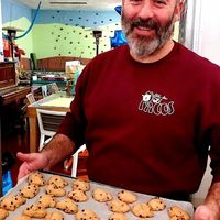 The owner and his homemade vegan biscotti  at Agriturismo Vita da Pacos bioparco sociale merenderia ludoteca in Fano