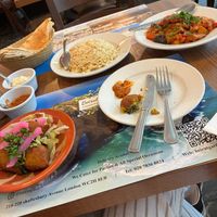 Kibbeh Lakteen starter withAubergine Mousaka B'zeit main and rice.  (Seemingly) complimentary bread and dips at Beirut Garden in London