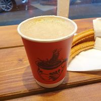 Spiced (and frothed) black Americano and churros at Aguamiel in London