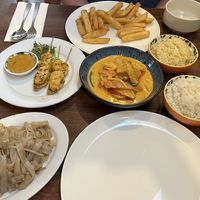 My vegan options - coconut rice, Thai red curry with tofu and rice noodles  at Mona's  in Weymouth