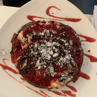 Chocolatewaffle with hot raspberries, oreos and vanilla pudding at Creperie Lamara in Hannover