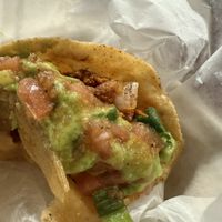 Plenty of faux meat under the generous amount of guac  at OAK - Cancun - T1  in Oakland