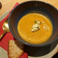 Potato vegetable soup with almond crunch and rosemary oil at Café & Kater in Traunstein
