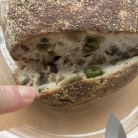 Inside the olive bread from Faria Bakery stand.   at Certified Farmers Market in Sacramento