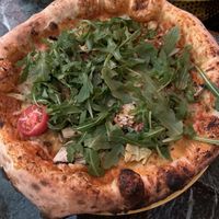 Pizza with pesto and vegan cheesee  at Florentine in Stockholm