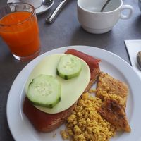Bread with vegan cold cuts, scrambled tofu and farinata at Gabry in Riva Del Garda