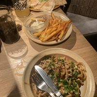 Split pea houmous, fries and peanut chilli noodles  at Brasserie Du Singe Savant in Lille