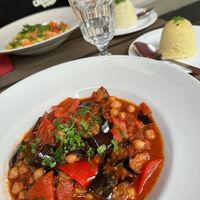 Veganer orientalischer Kichererbsen Auberginen Topf mit Couscous   at Aubergine in Bochum