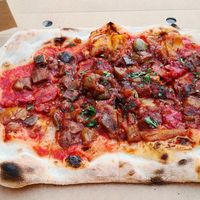 Take away caponata pizza at Aromi in Cambridge