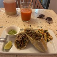 Sunny boost juice & burrito  at VEGGIE  in Cancun