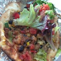 Inside a spicy garden taco (2 per order)...added vegan cheese and meatless crumbles at DellzVille in Charleston