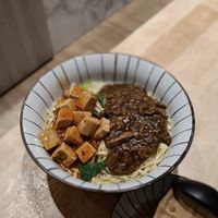 Yi Noodles 椒麻豆腐雙醬辣麵.  Tofu, mushroom, vegetables and noodles in two different types of gravy. at Miao Guanyin - 妙觀音素食 - Zhongzheng District in Taipei