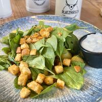 Potato and spinach stir-fry with tomatoes, croutons and vegan sour cream   at Platzhirsch in Pforzheim