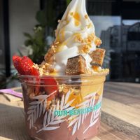 Large acai peanut bliss - with raw snickers coco soft serve granola and strawberries   at Blessed Bowls in Mosman