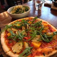 Vegan pizza and kale side salad at Francesca's Italian Kitchen in Wanaka