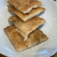 Scallion pancake (amazing—especially with chili oil)    at Hello Dumpling in Dallas