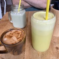 Ginger crush juice, flat white, and Sweet Green Protein shake  at Sùgh Ùr Café in Inverness