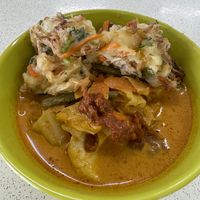 Lontong with a big fritter on top  at Tuo Yuan - 陀缘 in Central Singapore
