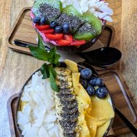 Sunshine and Pink Dragon Smoothie Bowls at PLANT SHACK - Cala Mayor in Mallorca
