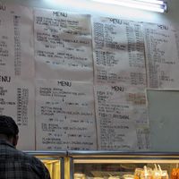 Menu posted on the wall at Vishal Food & Catering in Kuala Lumpur