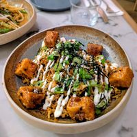 Kimchi Bokkeumbap: fried rice, kimchi & gochujang sesame sauce, organic salt & pepper tofu, garlic aioli, nori at Mildreds - Victoria in South West London