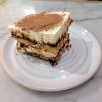 White Chocolate Tiramisu: almond sponge cake, coffee, white chocolate mousse at Mildreds - Victoria in South West London