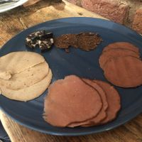 Our plate of salami slices, the pale one is the best!  at Bezmasna in Prague