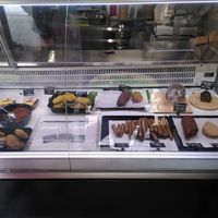 Glass cabinet inside the store with all the goodies! at Bezmasna in Prague